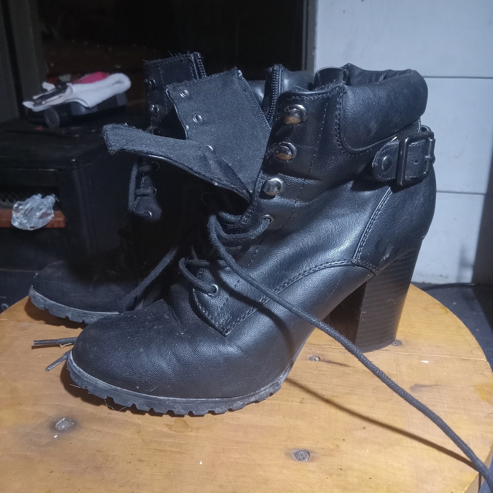 3" rubber soled black heel lace up dress boots.